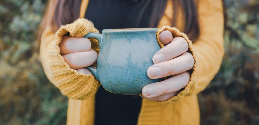 Woman Holding Cup